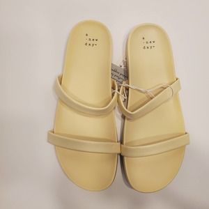 Women's Nadine Skinny Strap Sandals in Yellow - A New Day, 9